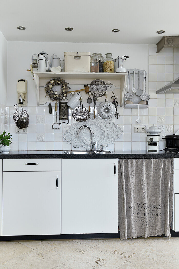 Nostalgic-style utensils in shabby-chic kitchen