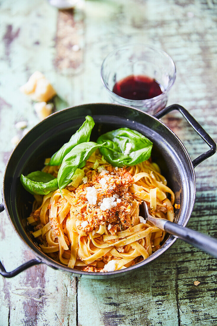 Fettuccine with chicken bolognese and basil