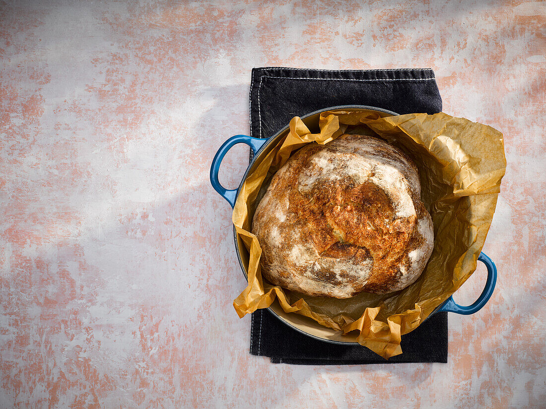 No Knead bread with parchment paper in a dutch oven