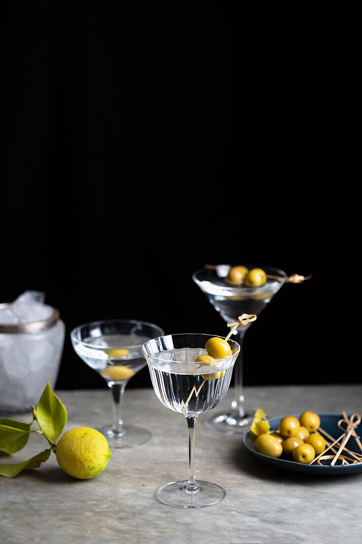 Martinis with olive skewers