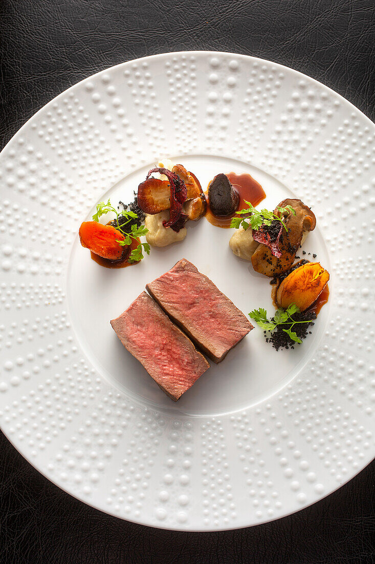 Saddle of venison with porcini mushrooms