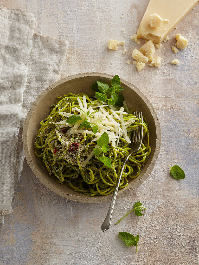 Spaghetti with home made pesto and Parmesan cheese