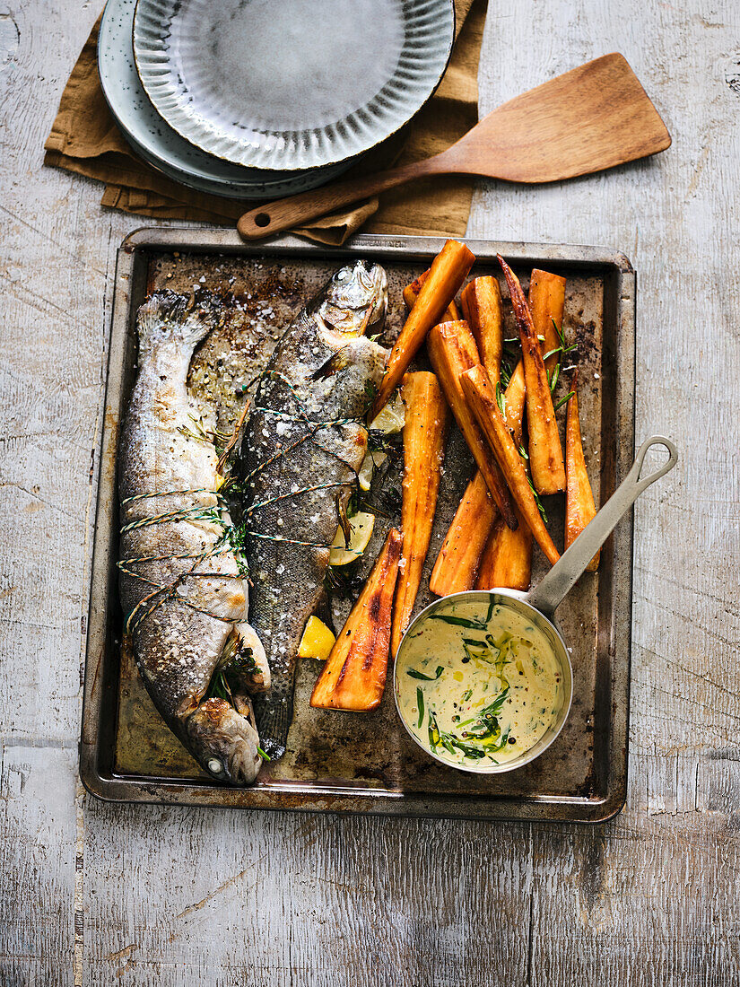Brown trout with oven roast guinness parsnips