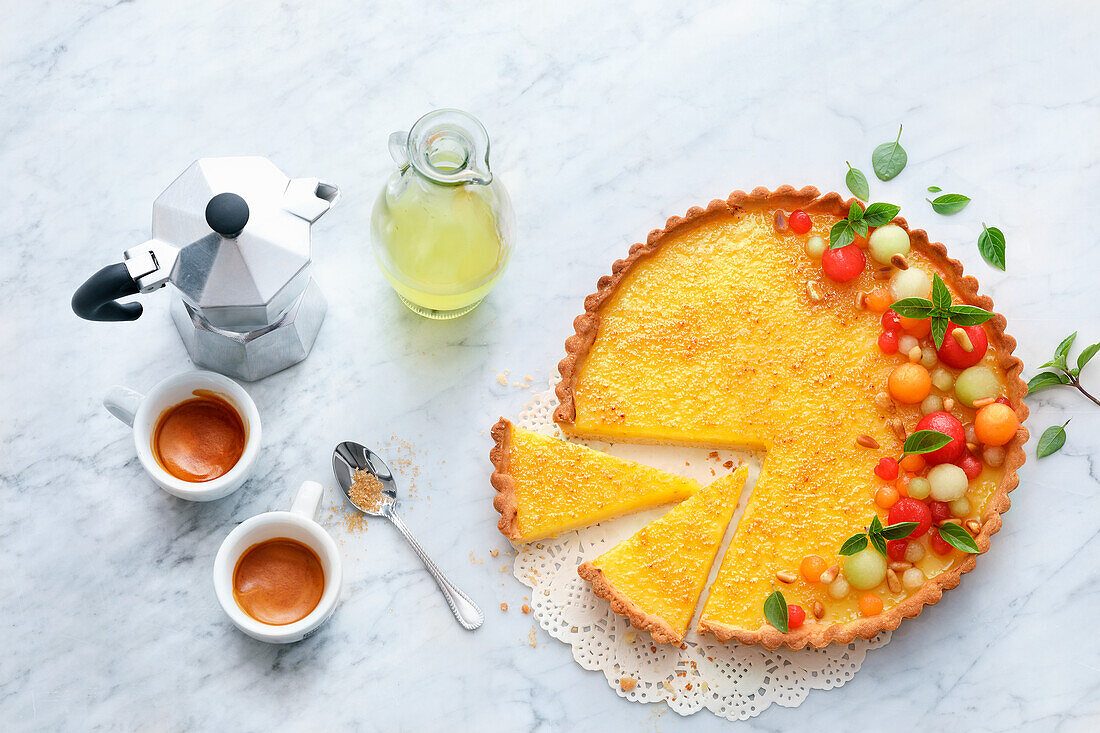 Caramelised limoncello tart with colourful melon salad