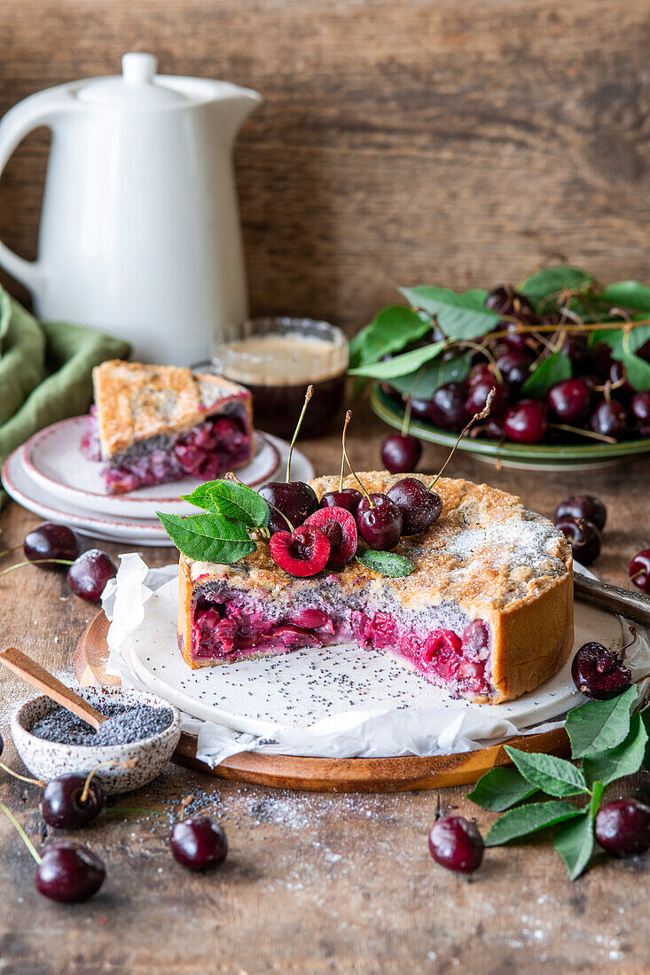 Cherry-poppy seed cake with sprinkles and cream cheese