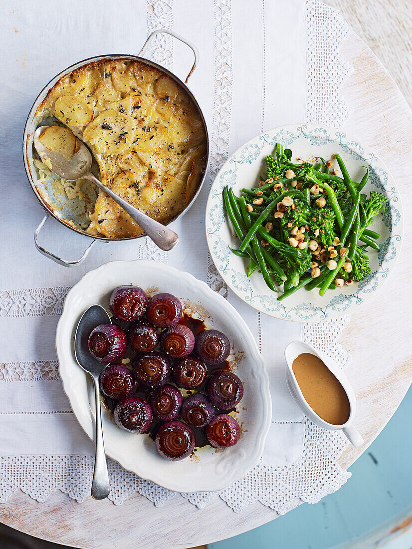 Lemony potato gratin, Broccoli and green beans with toasted hazelnut butter, Sweet roasted onions