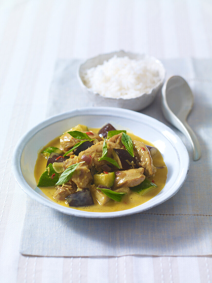 Bowl of chicken coconut curry and rice