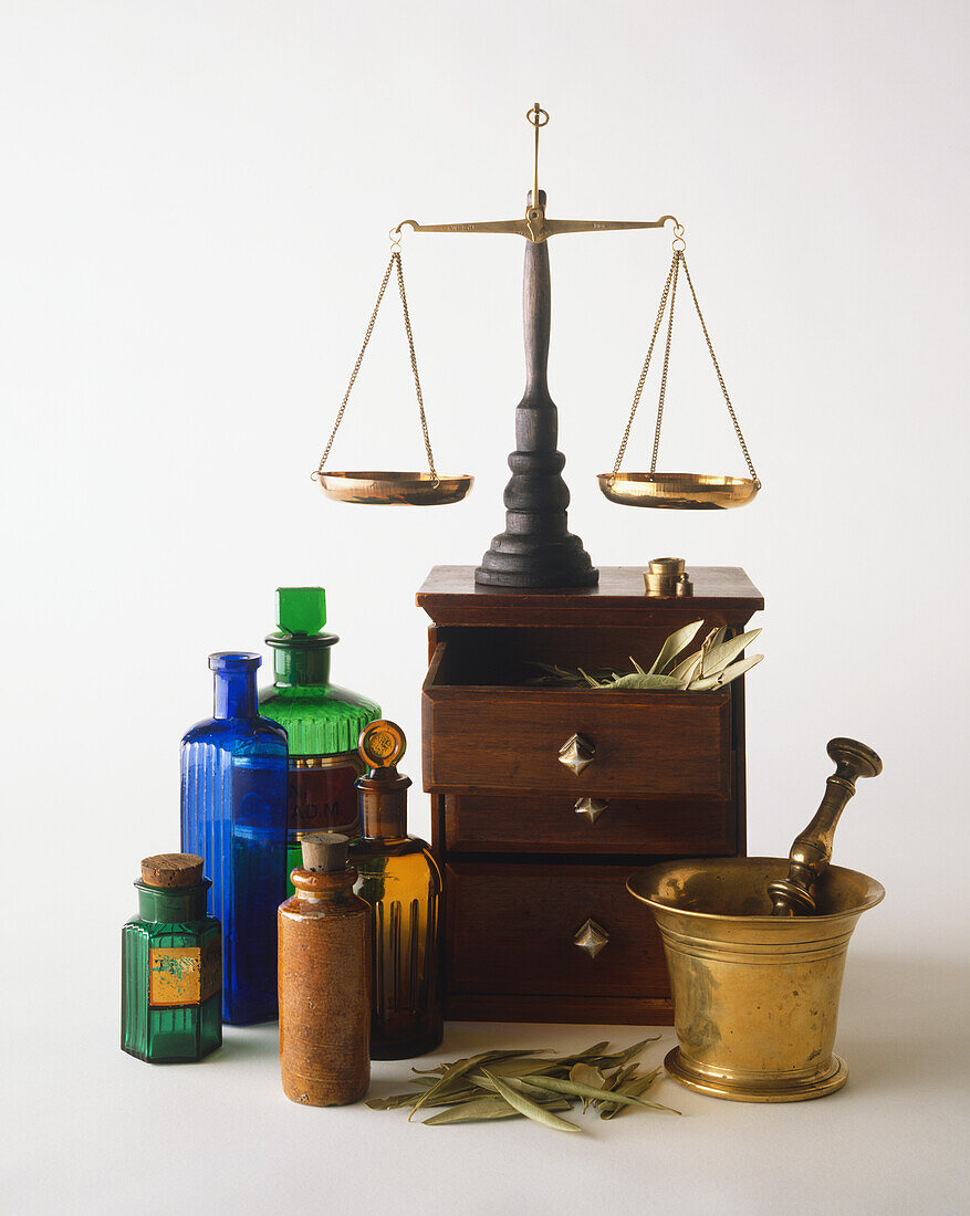 Scales, pestle and mortar, and bottles
