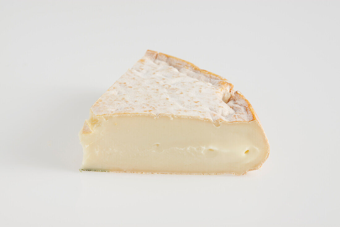 Slice of French reblochon de savoie AOC cow's milk cheese