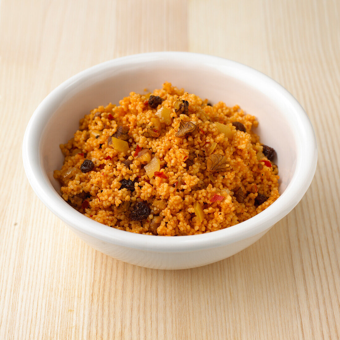 Couscous stuffing with harissa and walnuts