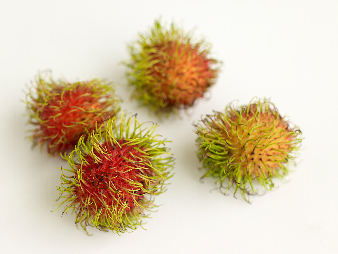 Four rambutans