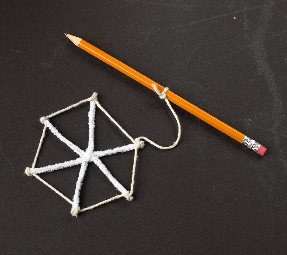 Pipe cleaner in snowflake shape