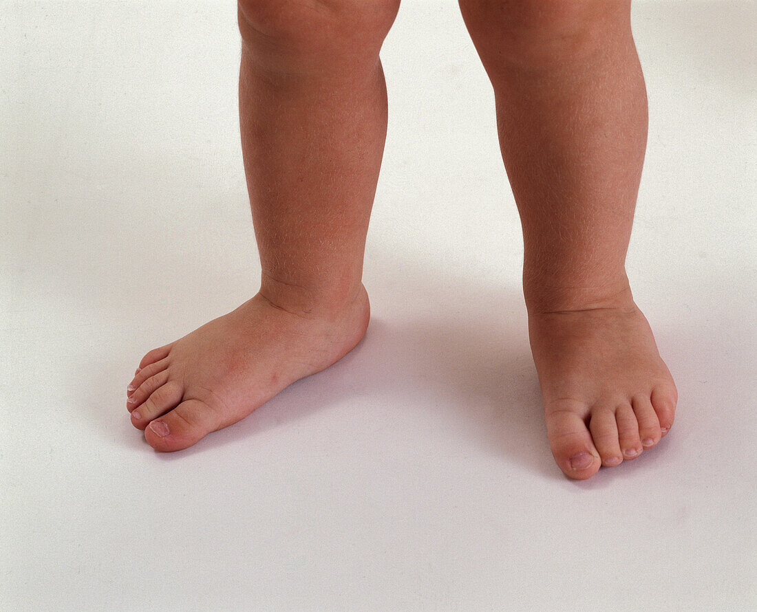 Two babies feet