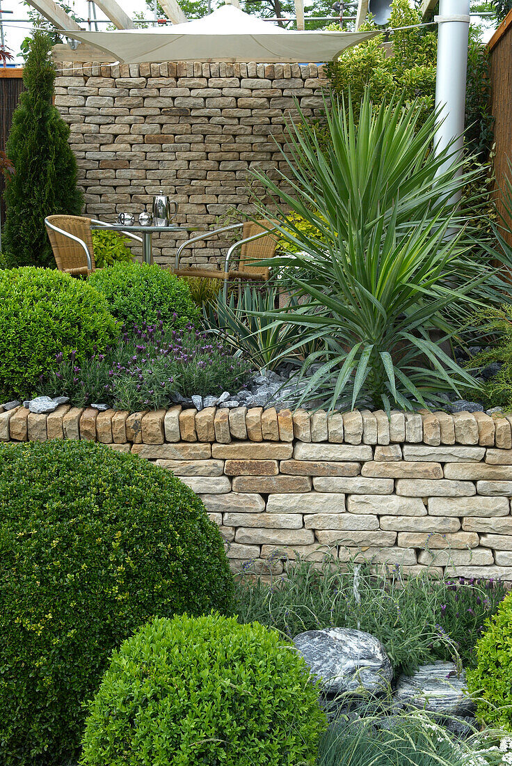 Terraced garden with seating area