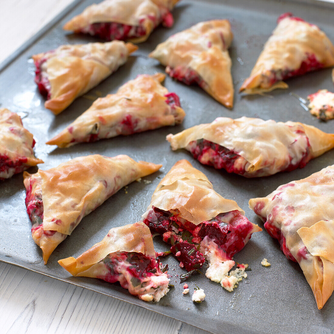 Beetroot and feta in filo pastry on baking tray