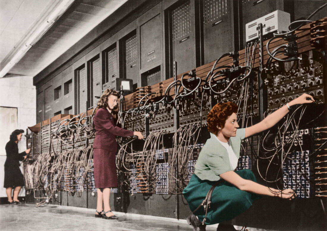Technicians connecting wires of ENIAC