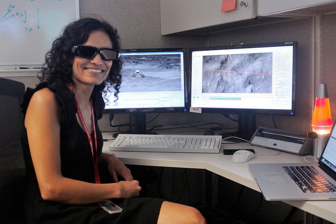 Engineer wearing 3D glasses to drive the Curiosity rover
