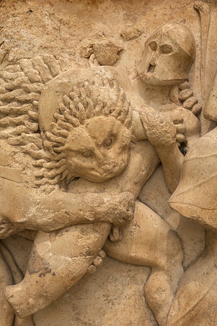 Lion attacking a giant, pediment. Delphi