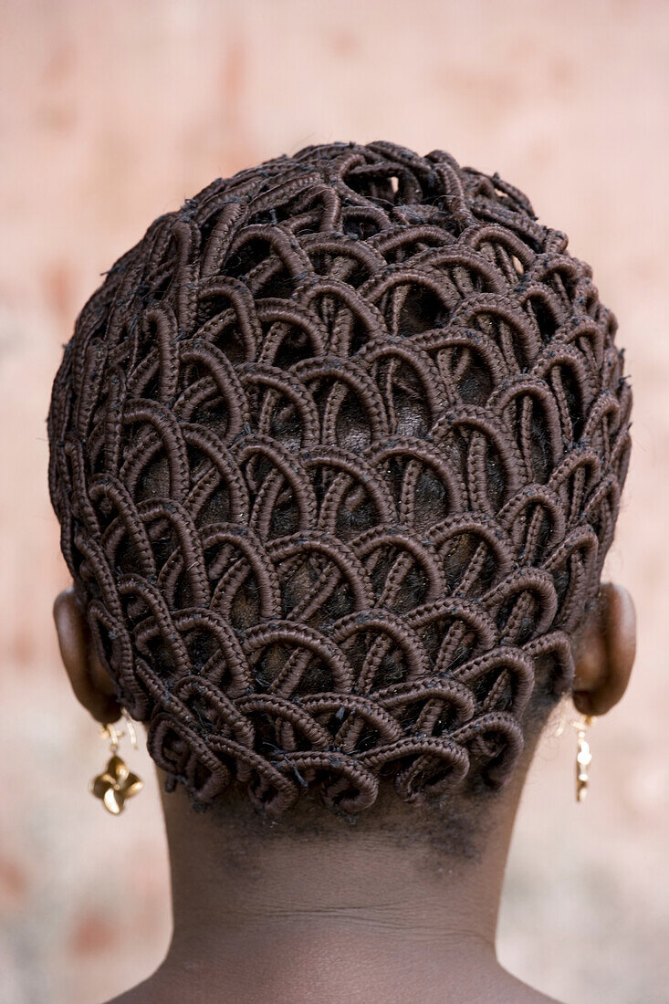 A woman's head with braided hair
