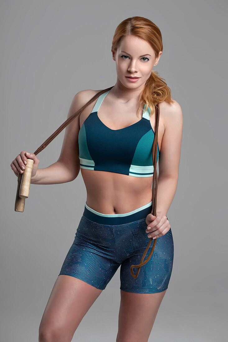 Woman posing with jump rope