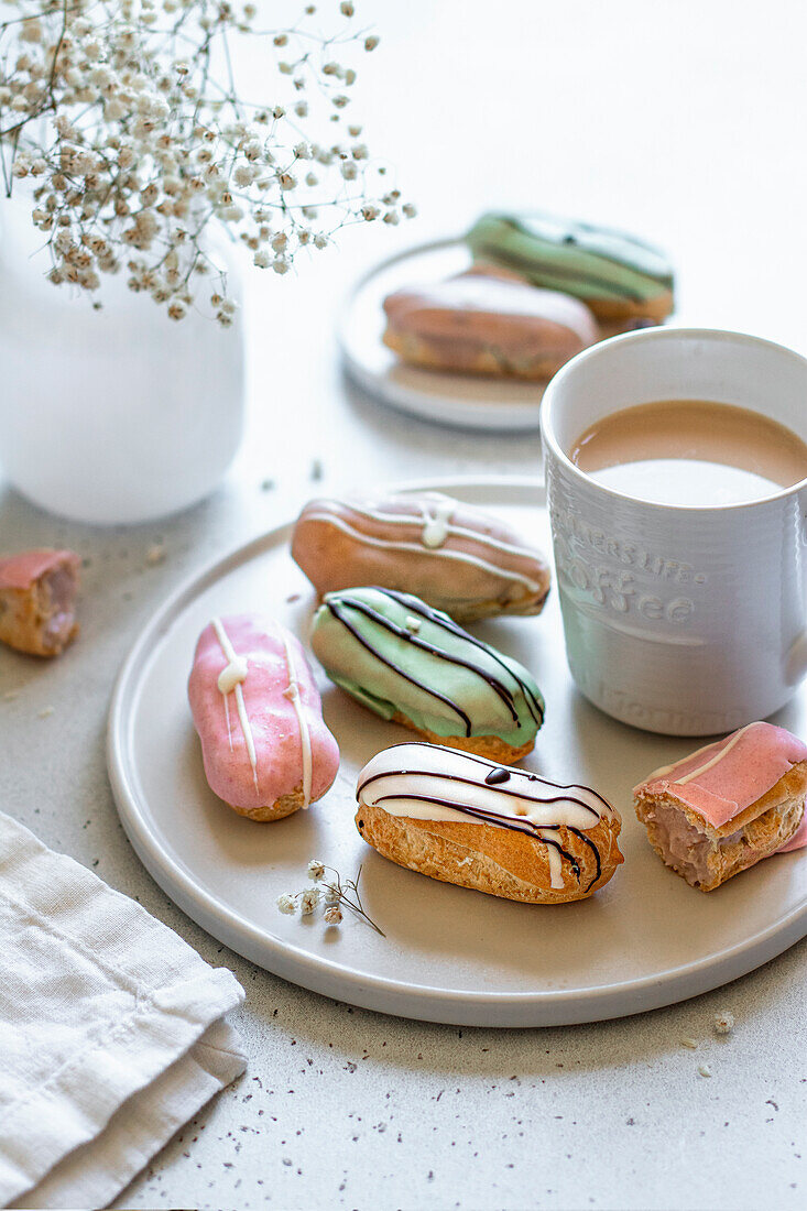 Eclairs with coffee