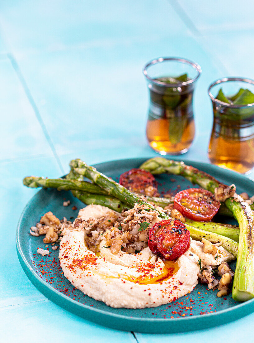 Hummus with green asparagus and roasted cauliflower
