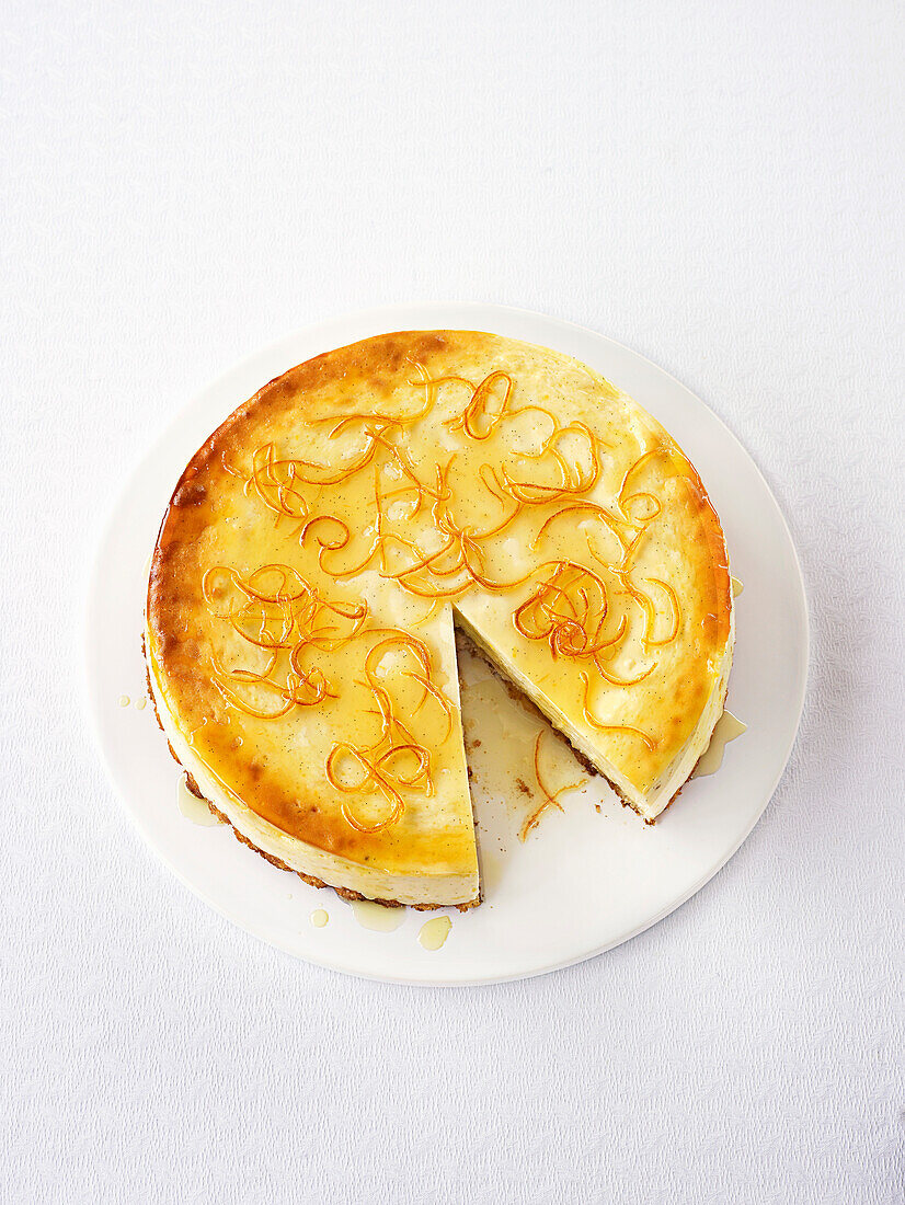 Lemon and vanilla cheesecake with candied lemon peel