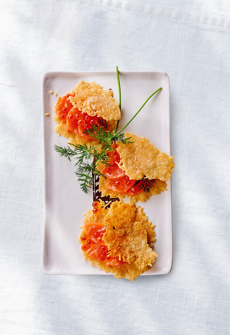 Cheese crisps with salmon