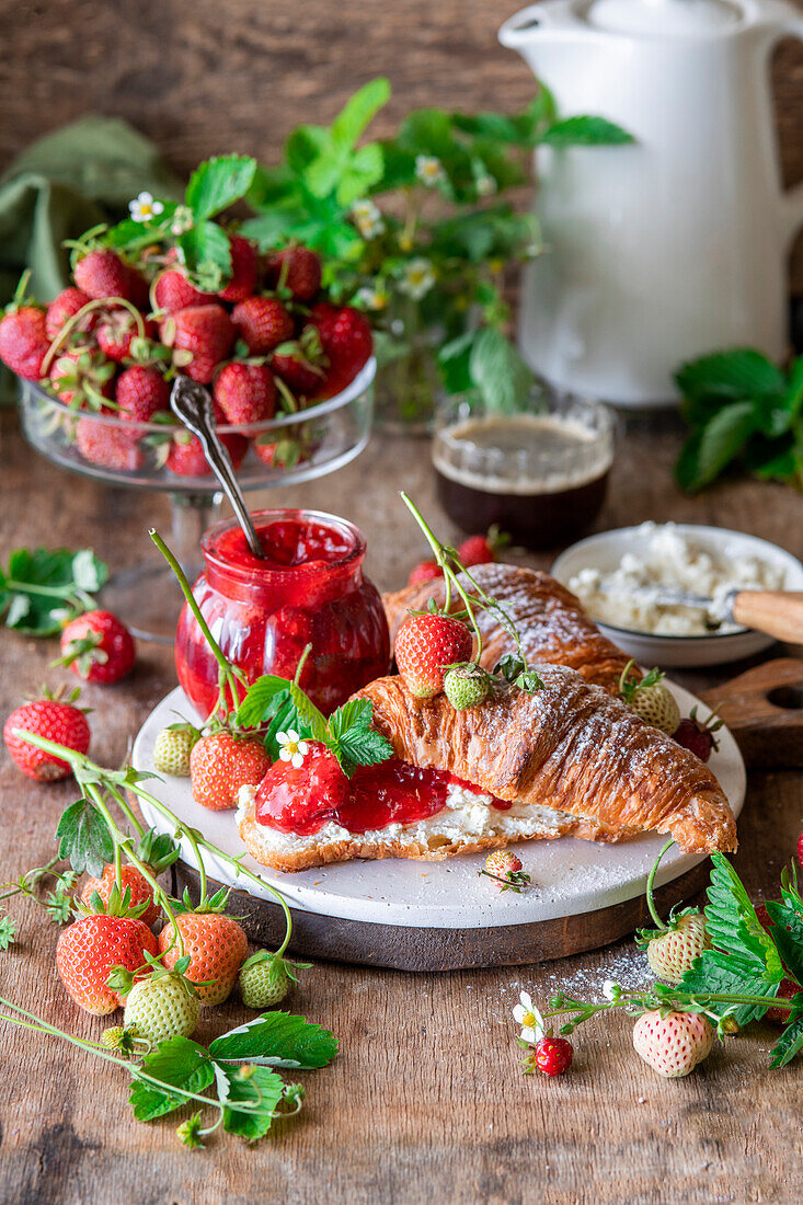 Strawberry jam with croissant and cream cheese