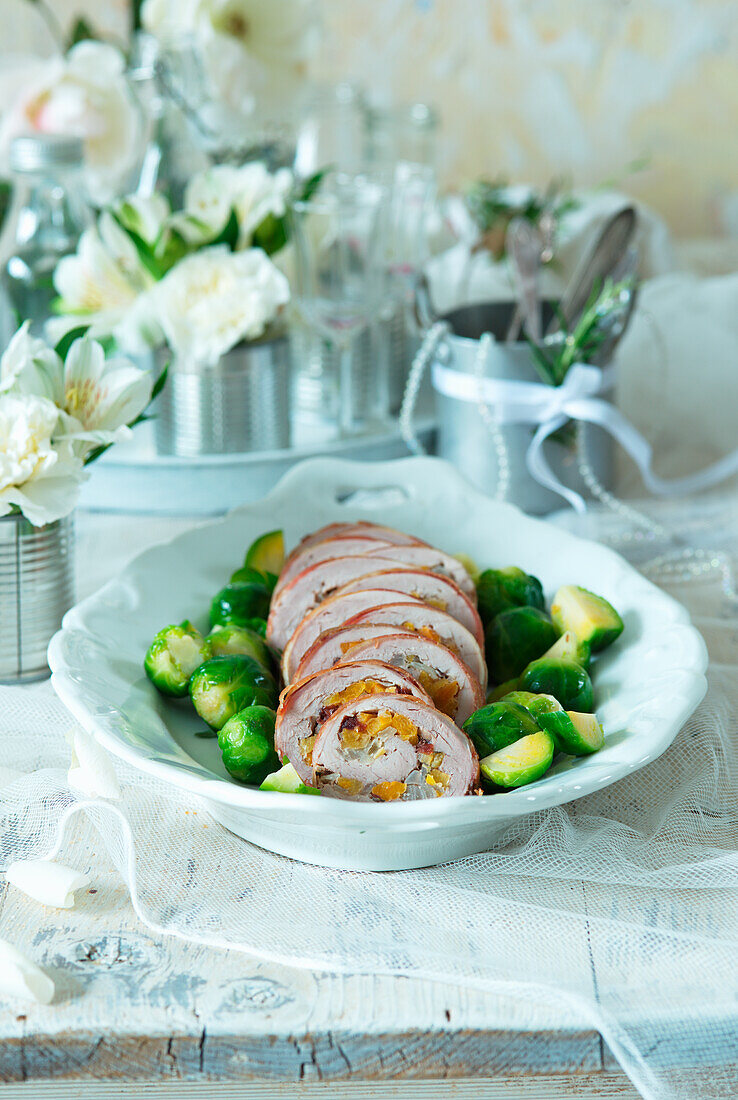 Stuffed turkey roll with Brussels sprouts