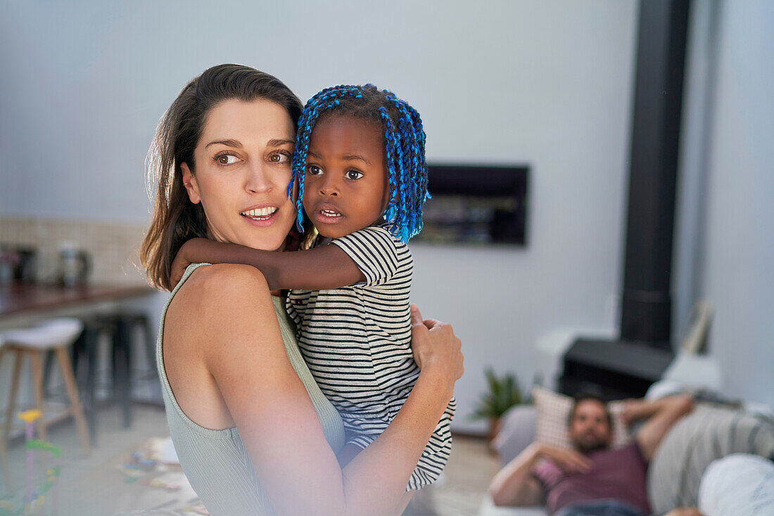 Mother and toddler daughter at home