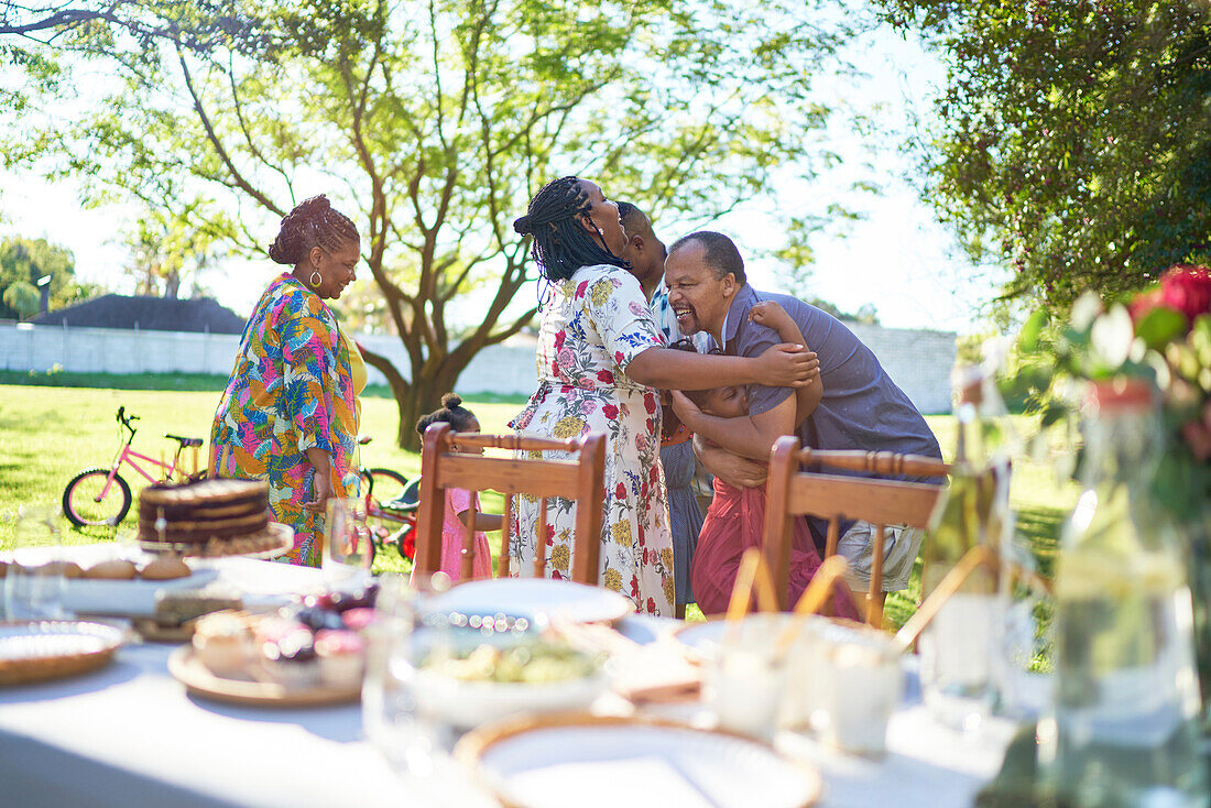 Happy multigenerational family in backyard