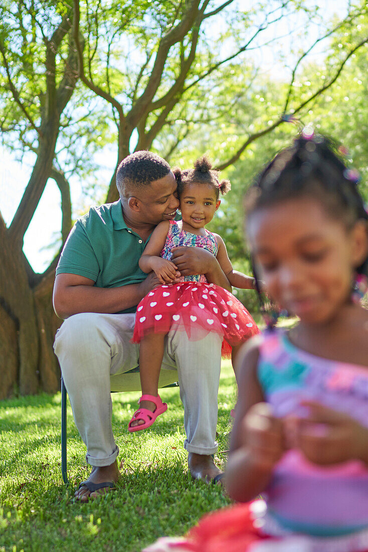 Father and daughter in park