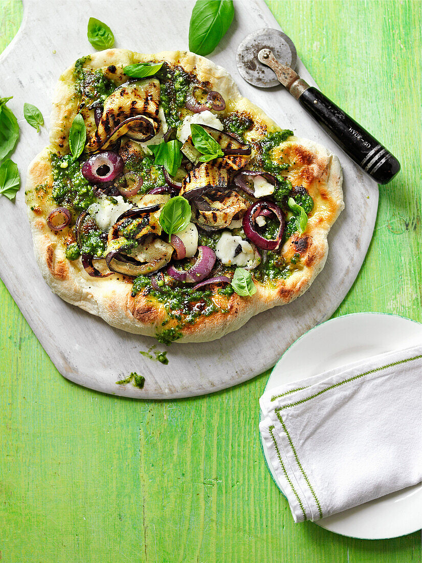 Pesto BBQ pizza with grilled aubergine, red onion and goats cheese