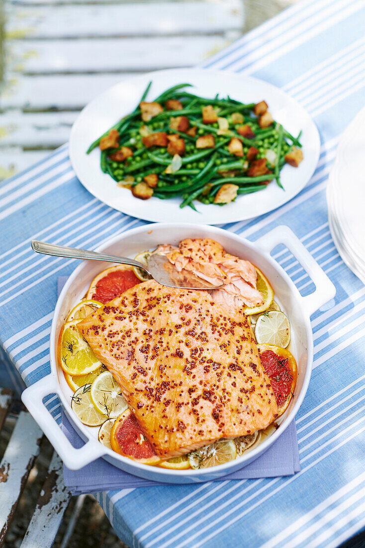 Sticky citrus and mustard glazed salmon, Peas and beans with crunchy croutons