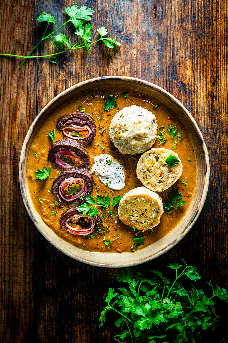 Beef roulades braised in red wine with bread dumplings