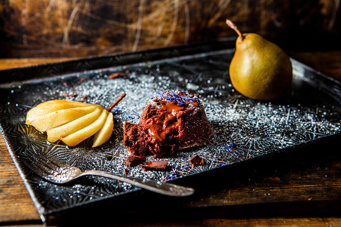Dark chocolate cake with braised cinnamon pears