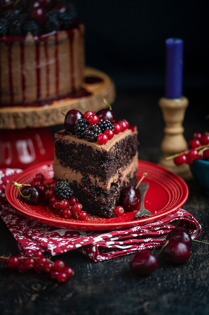 Vegan chocolate cake with fresh summer fruits