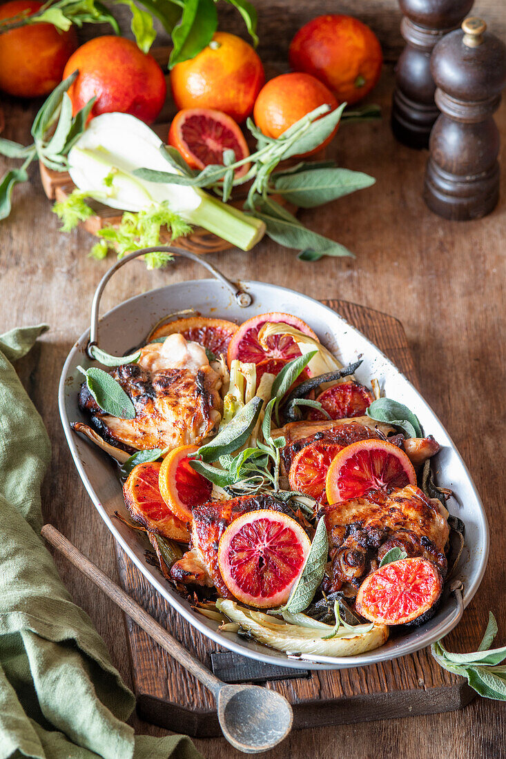 Chicken thighs with blood oranges and sage