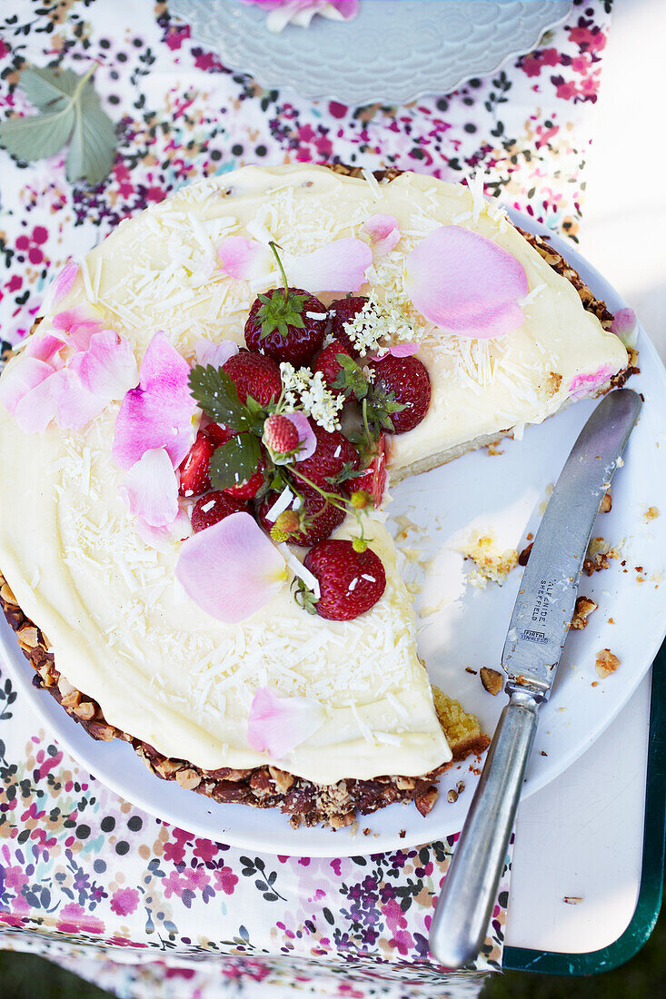 Marzipan cake with elderflower cream and strawberries