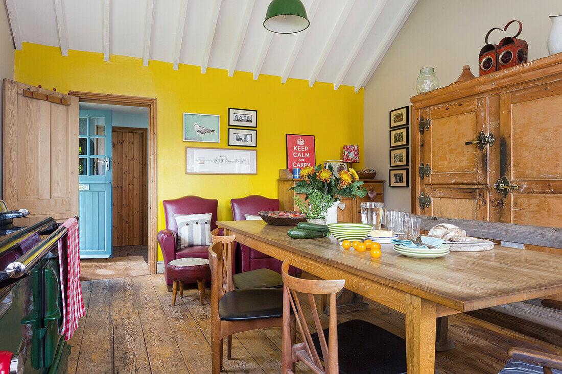 Dining area with country-style table and wooden furniture