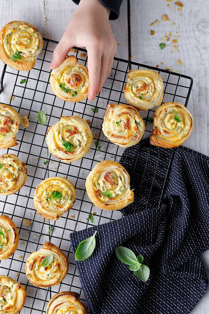 Spicy filled puff pastry snails