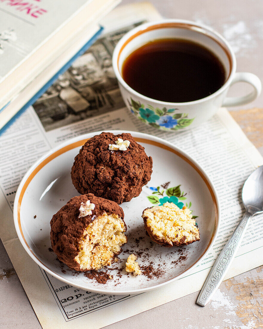 Kartoshka (chocolate truffles, Russia) with a cup of coffee