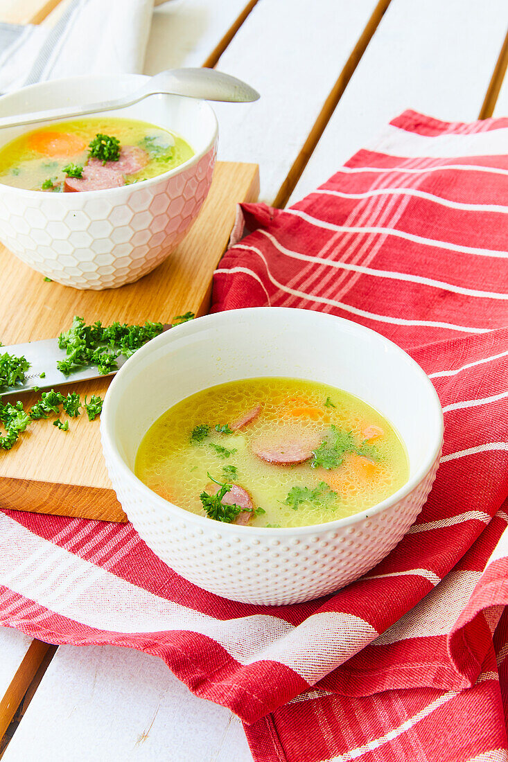 Carrot and potato stew with sausage slices