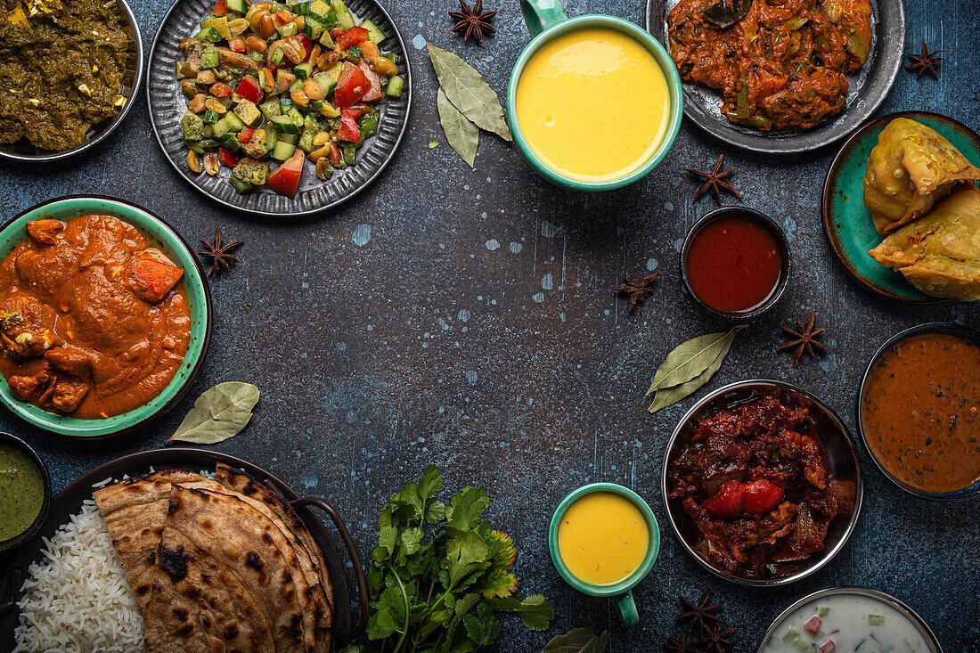 Indian ethnic food buffet on concrete table