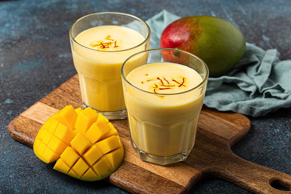 Ayurveda drink mango lassi in two glasses