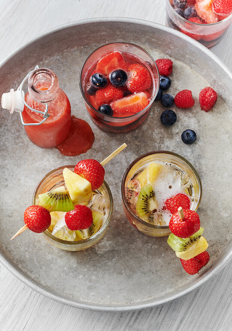 Fruity, non-alcoholic strawberry cocktail and rosé limes punch