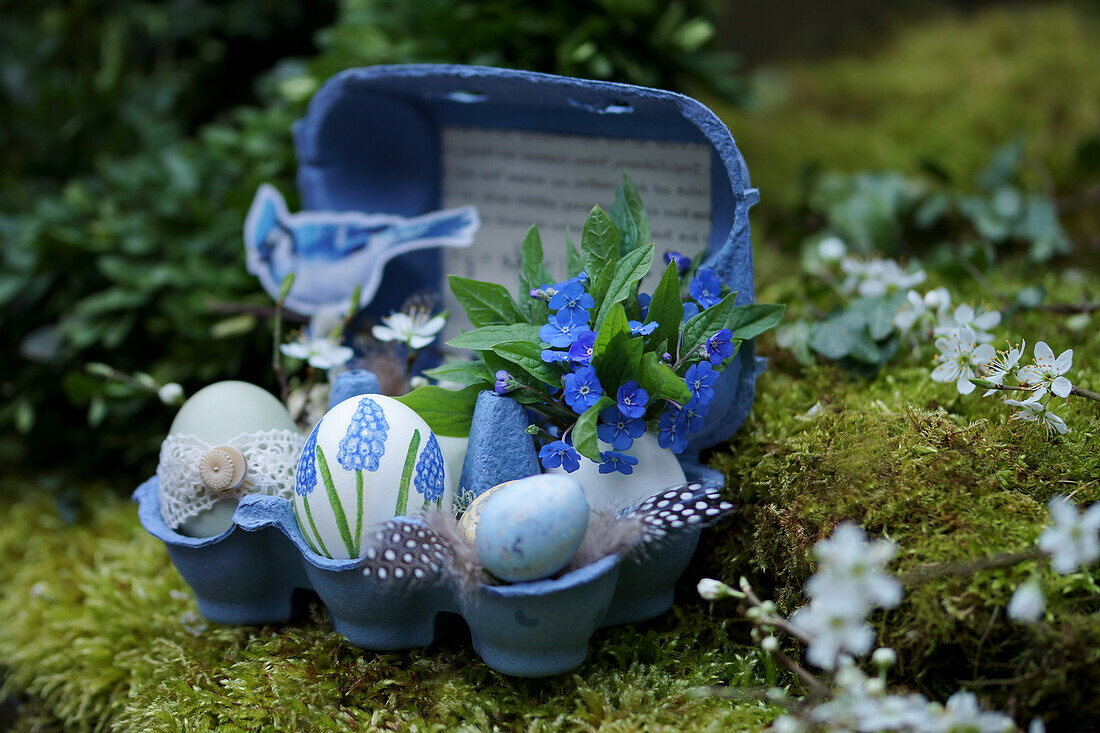 Decorated Easter eggs in an eggbox