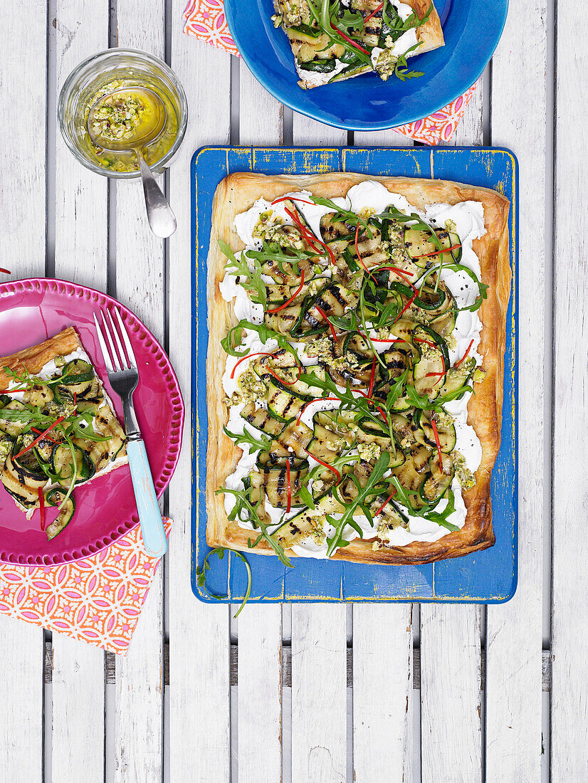 Goat’s cheese and courgette tart with pistachio dressing