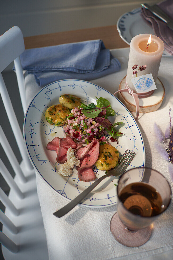 Roast beef with potato dal and herring tartar